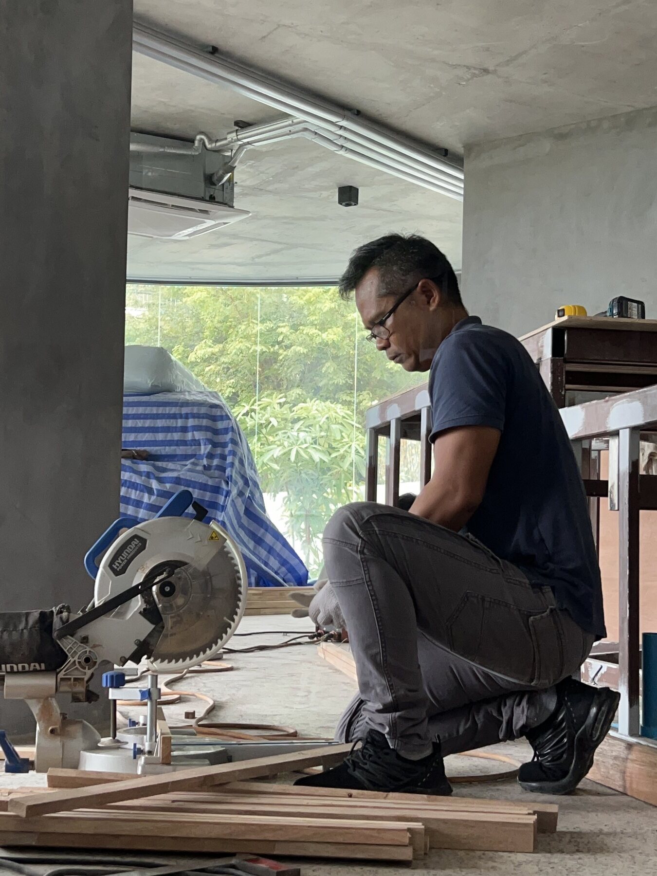 Adam Group craftsman fabricating interior elements for Cannelle Phuket