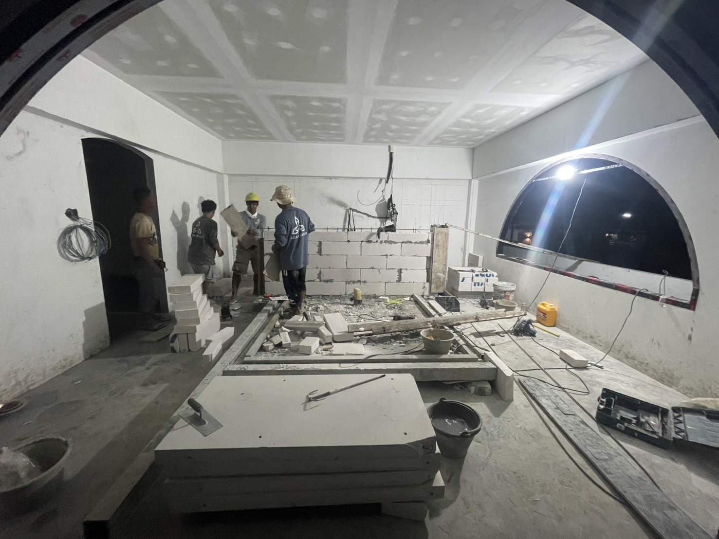 Interior walls and arched openings taking shape during Villa Kyma construction