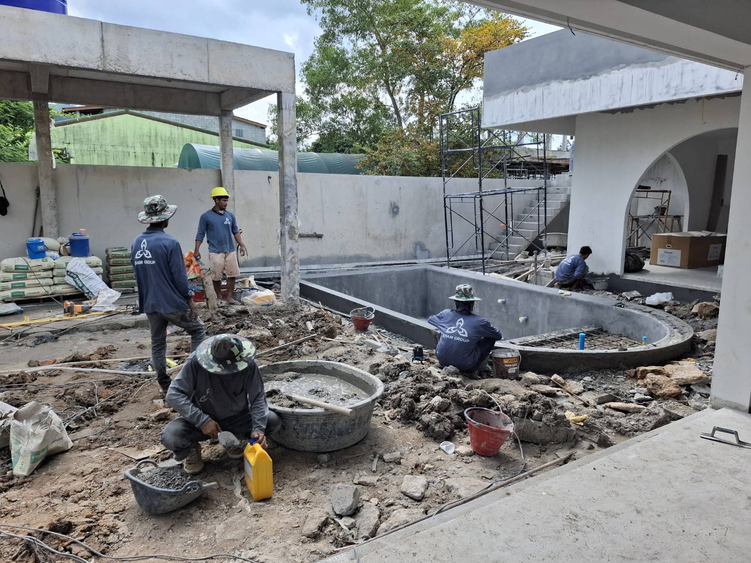 Adam Group team constructing the pool and concrete structure at Villa Kyma